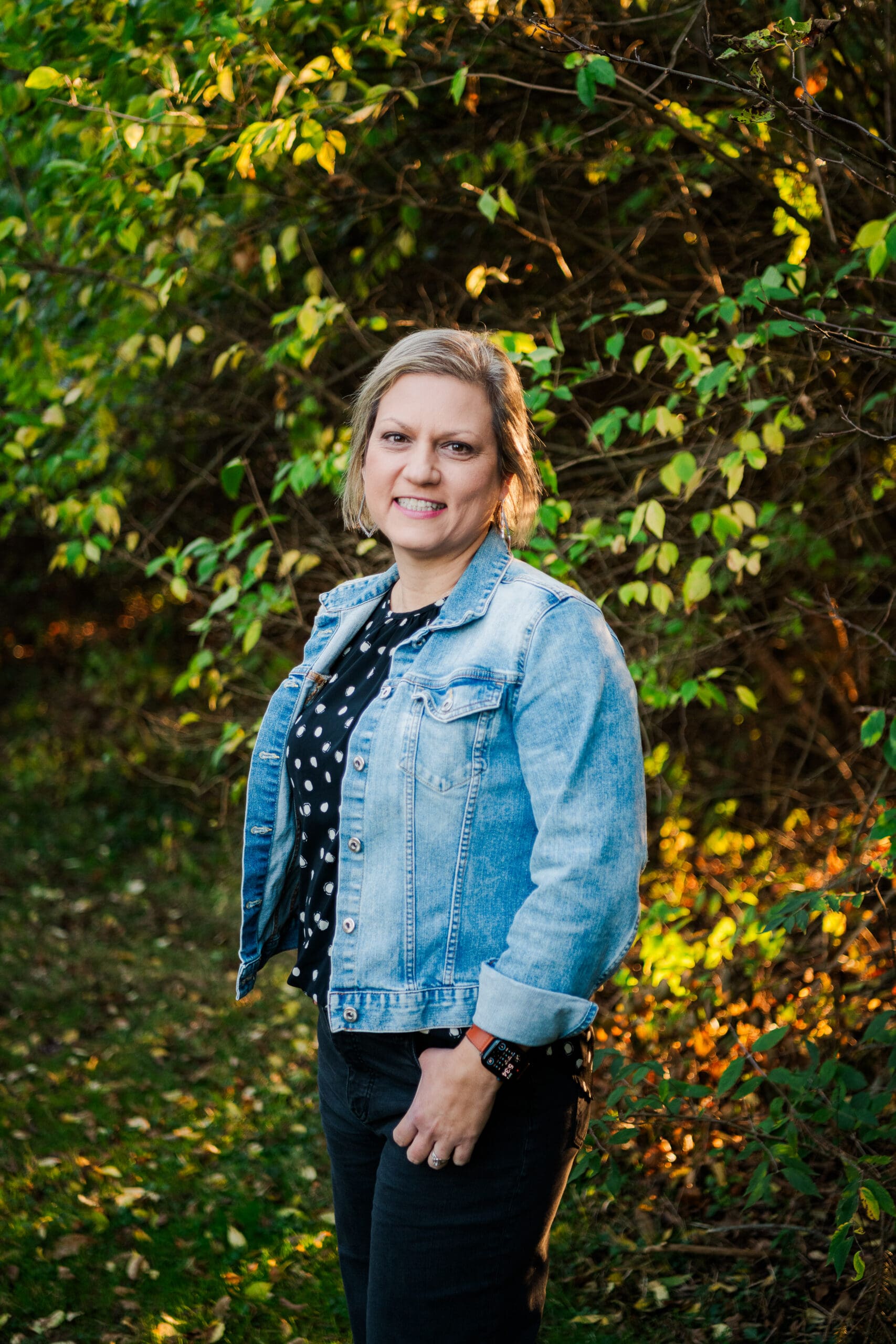 woman posing with thumb in pocket