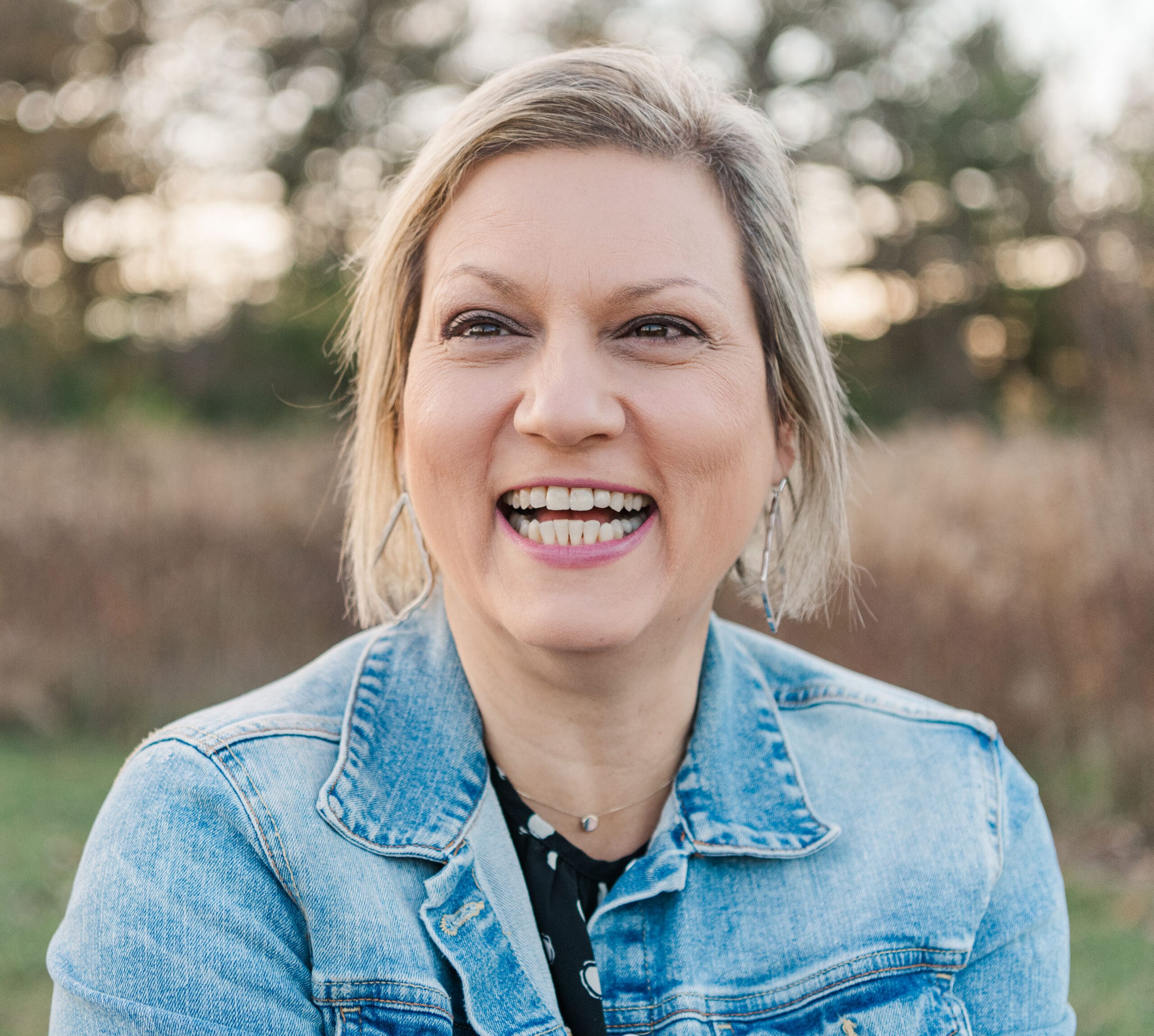 woman laughing at something off camera